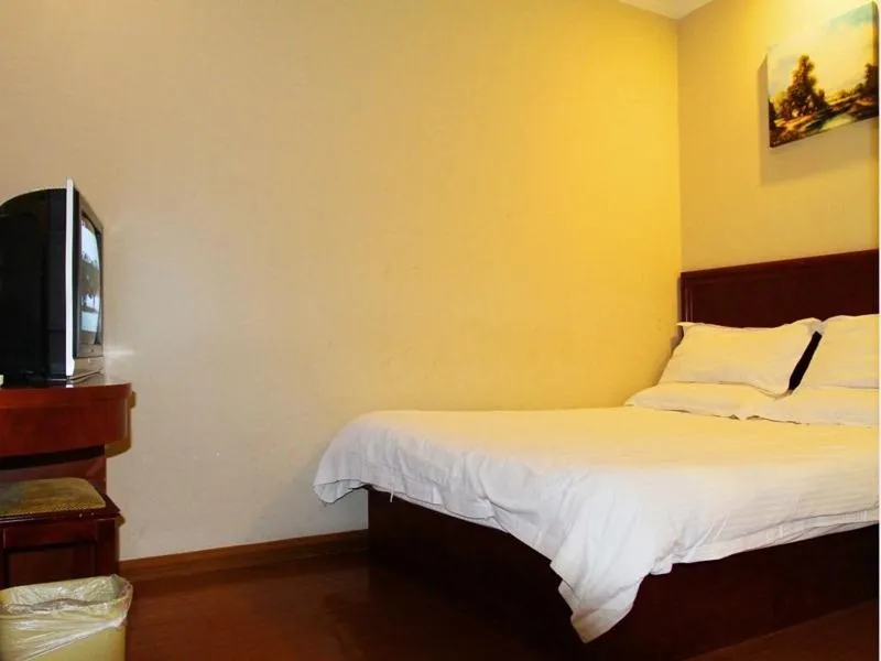 Bed in GreenTree Inn Jiangsu Nantong Rugao Ninghai Road Express Hotel