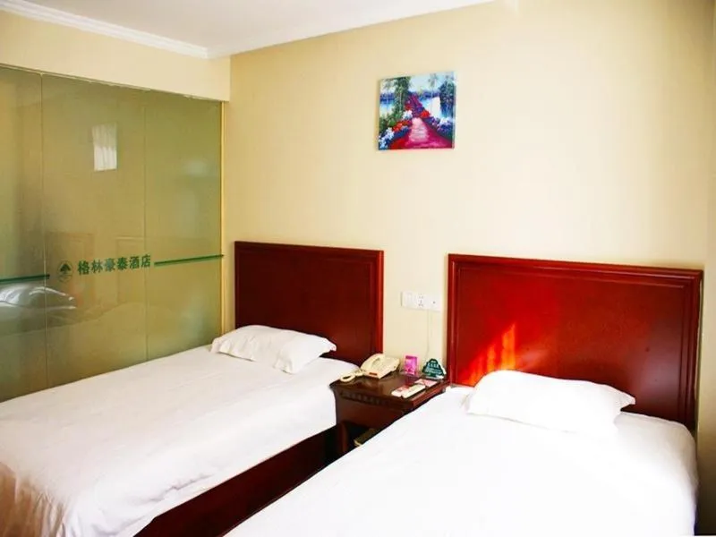 Bed in GreenTree Inn Jiangsu Nantong Rugao Ninghai Road Express Hotel
