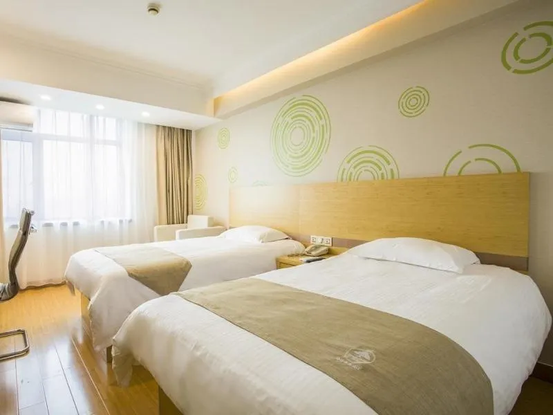 Bed in GreenTree Inn Jiangsu YangZhou Mansions Business Hotel