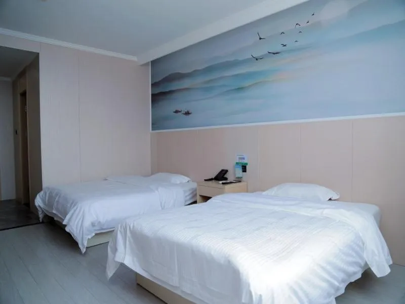 Bed in GreenTree Inn Jiangsu Yangzhou West Passenger Station Baixiang Road Express Hotel