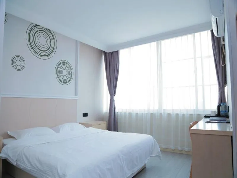 Bed in GreenTree Inn Jiangsu Yangzhou West Passenger Station Baixiang Road Express Hotel
