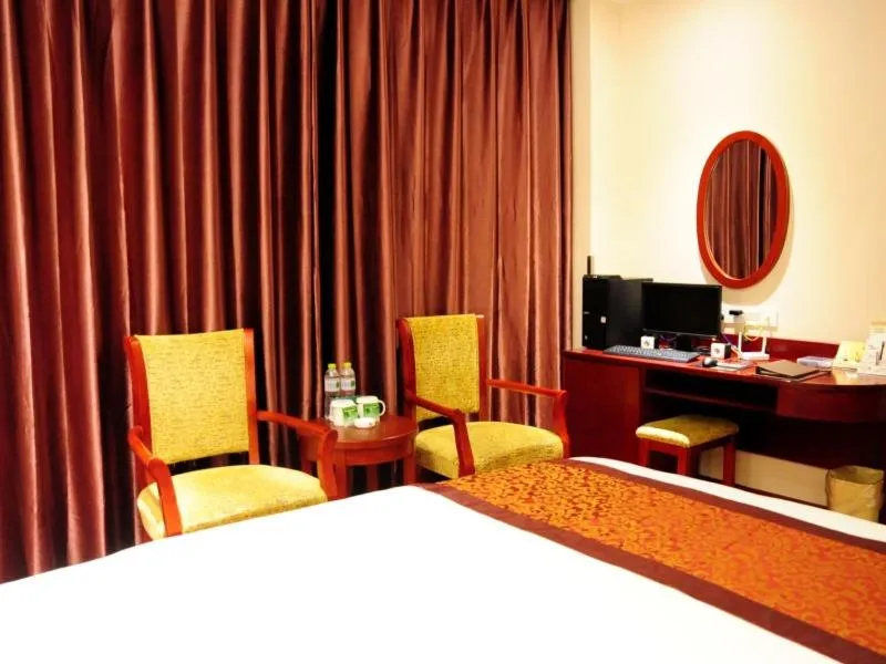 Bed in GreenTree Inn Jiangsu Yancheng Dongtai Jianggang Yingbin Road Gangcheng Avenue Business Hotel