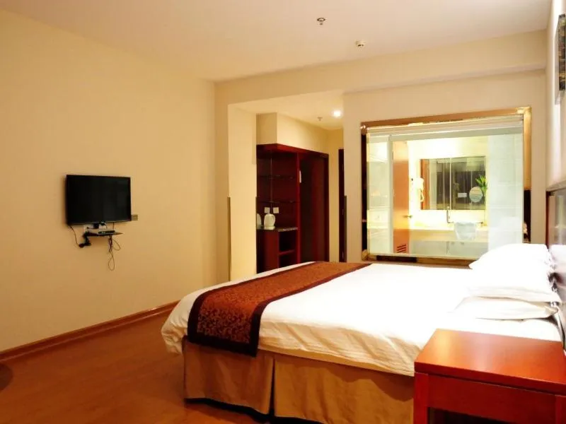Bed in GreenTree Inn Jiangsu Yancheng Dongtai Jianggang Yingbin Road Gangcheng Avenue Business Hotel