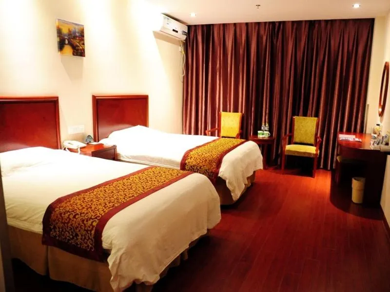 Bed in GreenTree Inn Jiangsu Yancheng Dongtai Jianggang Yingbin Road Gangcheng Avenue Business Hotel
