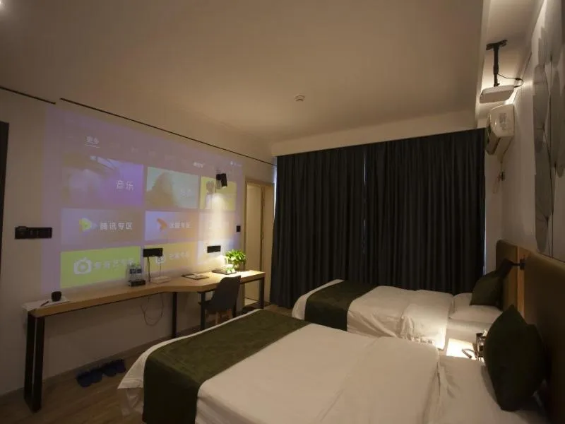 Bed in GreenTree Inn Jiangsu Lianyungang Guannan West Renmin Road Express Hotel