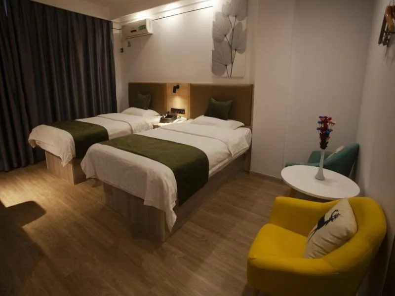 Bed in GreenTree Inn Jiangsu Lianyungang Guannan West Renmin Road Express Hotel