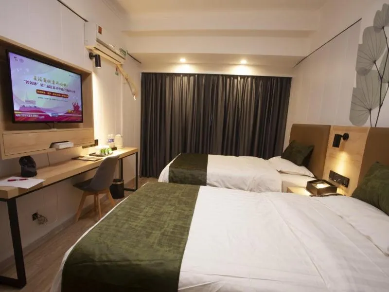 Bed in GreenTree Inn Jiangsu Lianyungang Guannan West Renmin Road Express Hotel