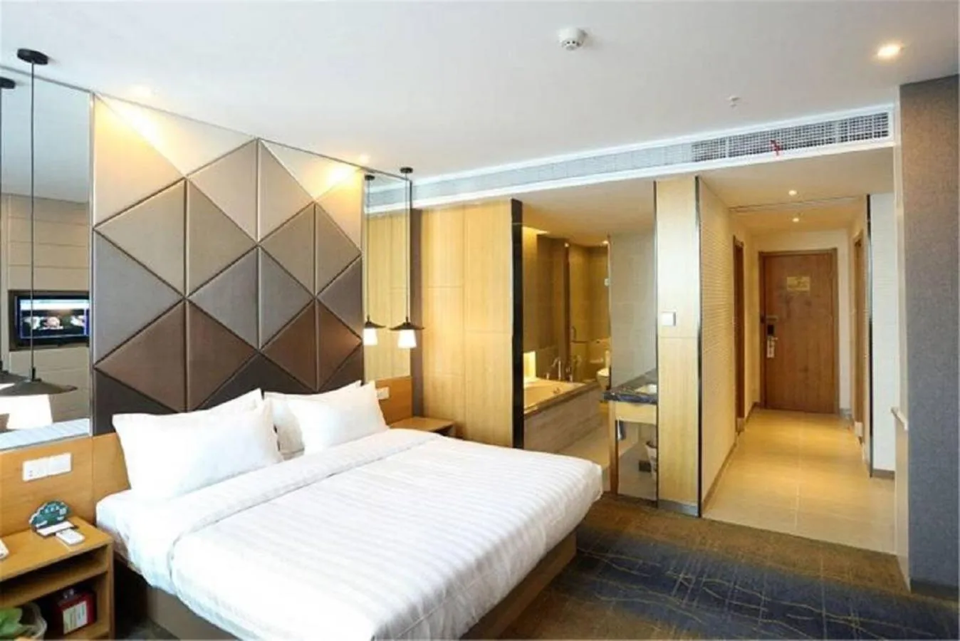 Bed in GreenTree Inn Jiangsu Taizhou Dongfeng Road Express Hotel