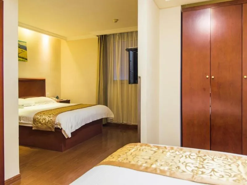 Bed in GreenTree Inn Jiangsu Taizhou Jingjiang Bus Station Express Hotel