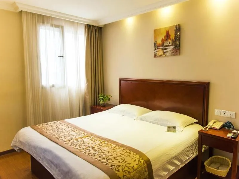 Bed in GreenTree Inn Jiangsu Taizhou Jingjiang Bus Station Express Hotel