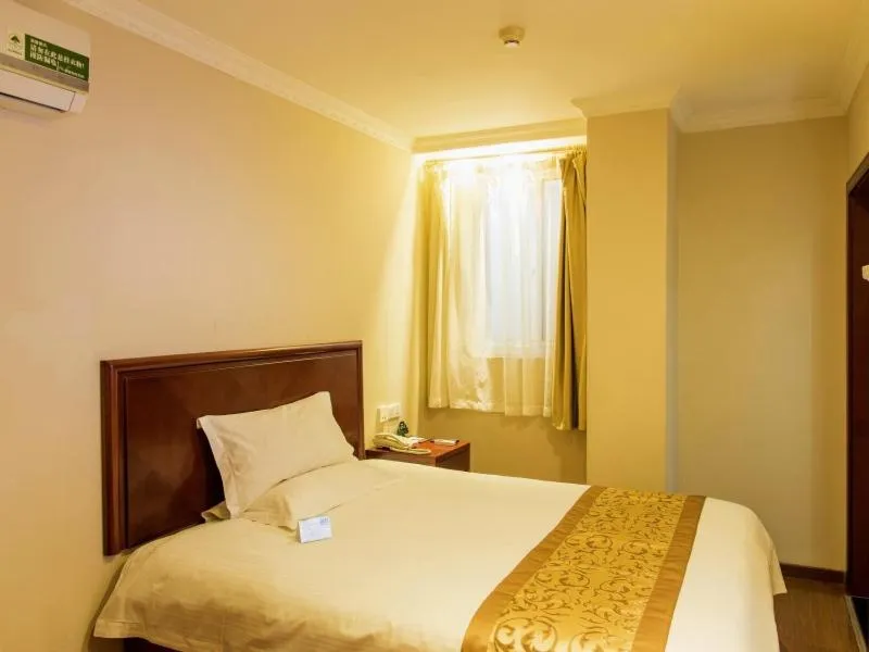Bed in GreenTree Inn Jiangsu Taizhou Jingjiang Bus Station Express Hotel