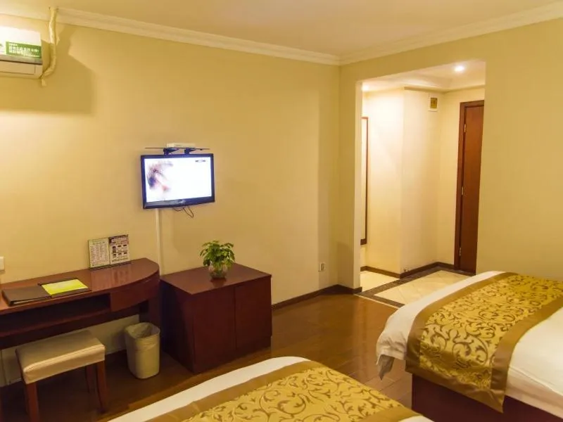 Bed in GreenTree Inn Jiangsu Taizhou Jingjiang Bus Station Express Hotel