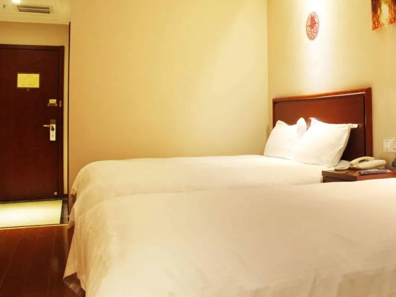 Bed in GreenTree Inn Shandong Qingdao Development District SDUST Express Hotel