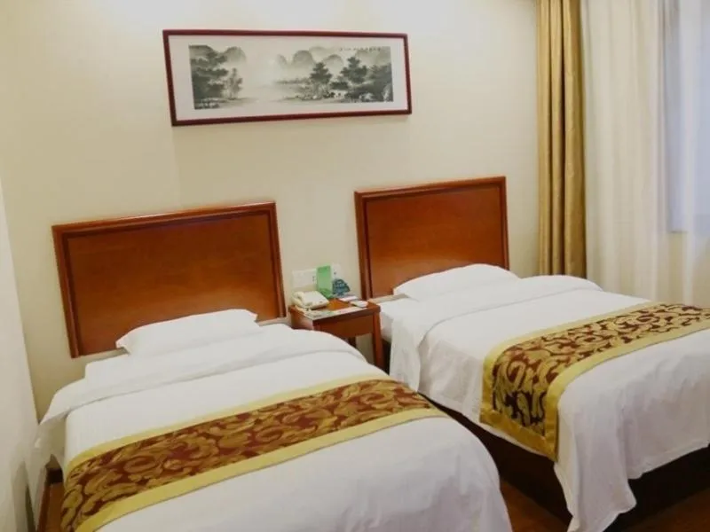 Bed in GreenTree Inn Anhui Hefei Lujiang Yulongwan Express Hotel