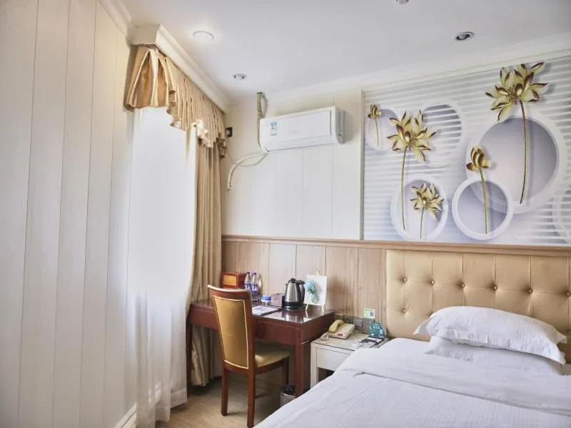 Bed in GreenTree Inn Guangdong Foshan Longjiang North Fenghua Road Express Hotel