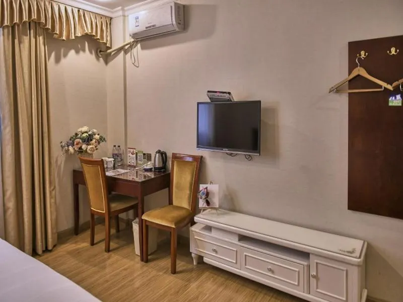 Bed in GreenTree Inn Guangdong Foshan Longjiang North Fenghua Road Express Hotel