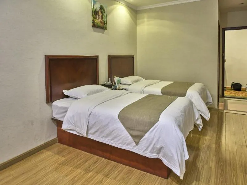 Bed in GreenTree Inn Guangdong Foshan Longjiang North Fenghua Road Express Hotel