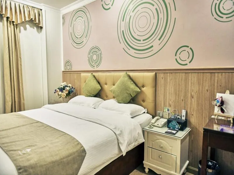 Bed in GreenTree Inn Guangdong Foshan Longjiang North Fenghua Road Express Hotel