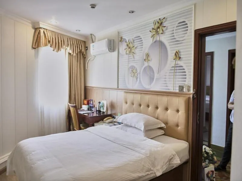 Bed in GreenTree Inn Guangdong Foshan Longjiang North Fenghua Road Express Hotel