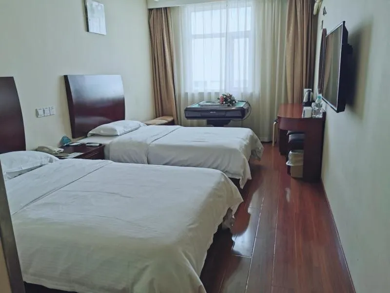 Bed in GreenTree Inn ShangHai Car Piers Studio Express Hotel