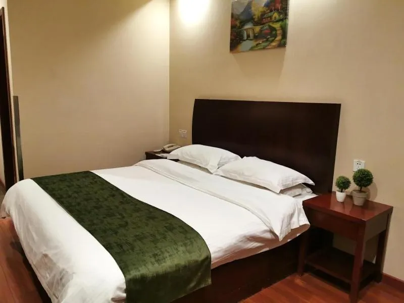 Bed in GreenTree Inn ShangHai Car Piers Studio Express Hotel