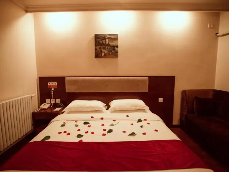 Bed in GreenTree Inn HeBei ZhangJiaKou ZhangBei Caoyuantian Rd ZhangKu Avenue Express Hotel