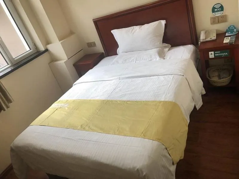 Bed in GreenTree Inn Shanxi Xinzhou South Jianshe Road Express Hotel