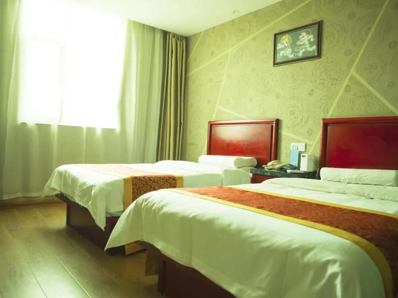 Bed in GreenTree Inn Shanxi Taiyuan Guomao Business Hotel