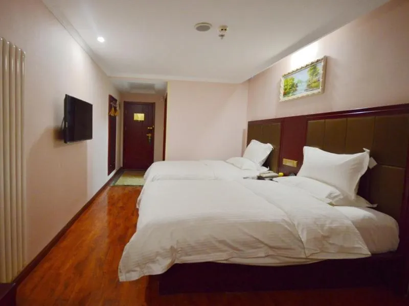 Bed in GreenTree Inn Shanxi Taiyuan Jianshe S) Road Inner Ring Express Hotel