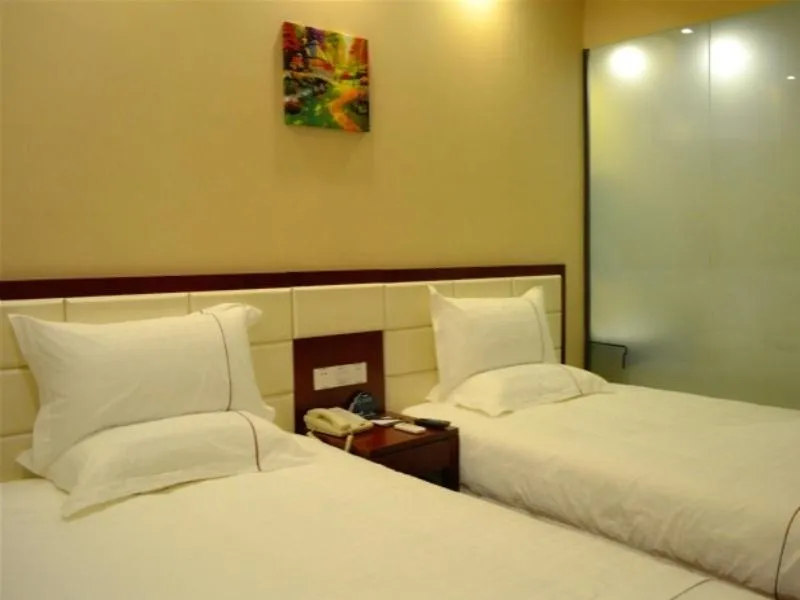 Bed in GreenTree Inn ShanXi LuLiang FengShan Road Central Park Express Hotel
