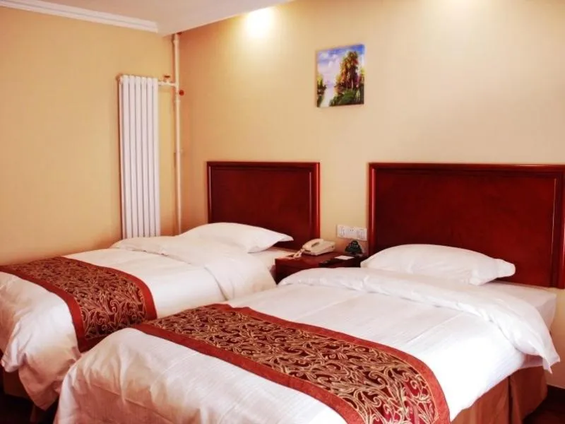 Bed in GreenTree Inn ShanDong WeiFang LinQu ZhanQian Road LuChuan Business Hotel