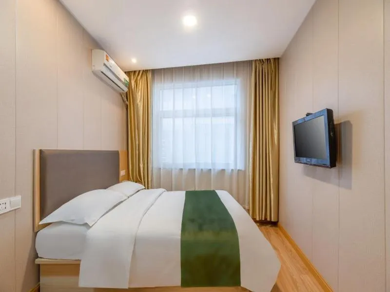 Bed in GreenTree Inn Shandong Jining Railway Station Express Hotel