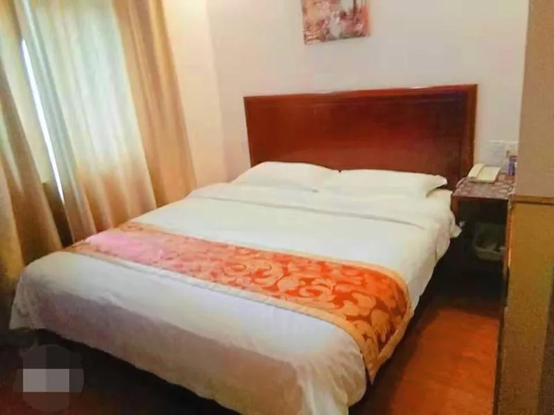 Bed in GreenTree Inn Shandong Jining Zoucheng South Yishan Road Experimental Middle School Express Hotel