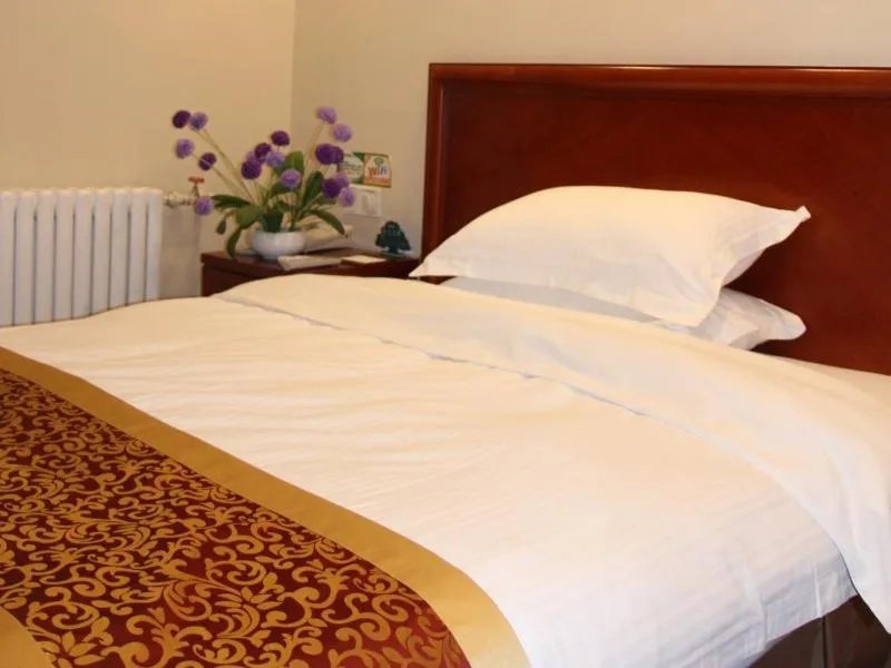 Bed in GreenTree Inn ShanDong JiNing ZouCheng ChangPingShan Road ChangPing Garden Express Hotel