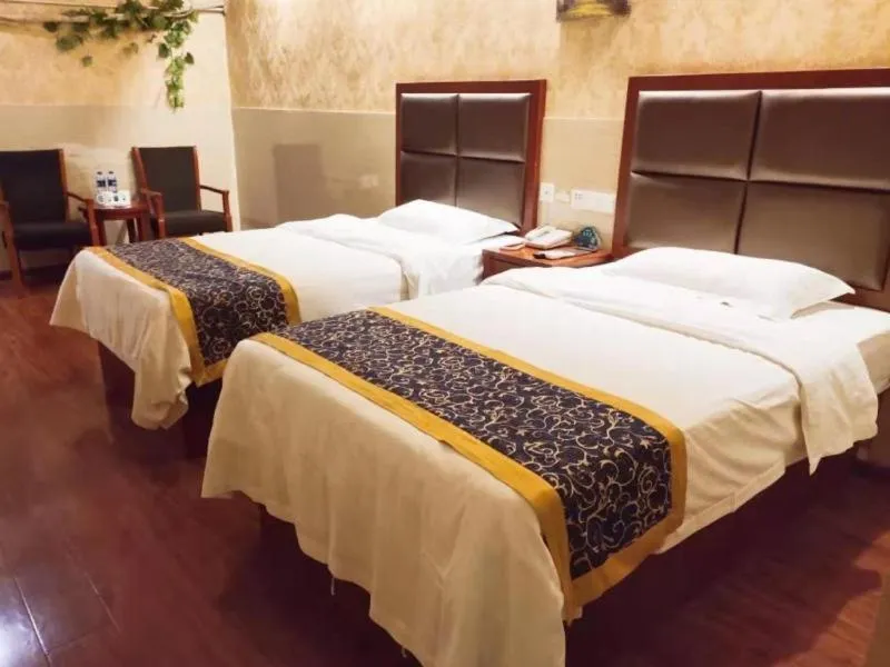 Bed in GreenTree Inn Anhui Bozhou Agricultural Trade City Express Hotel