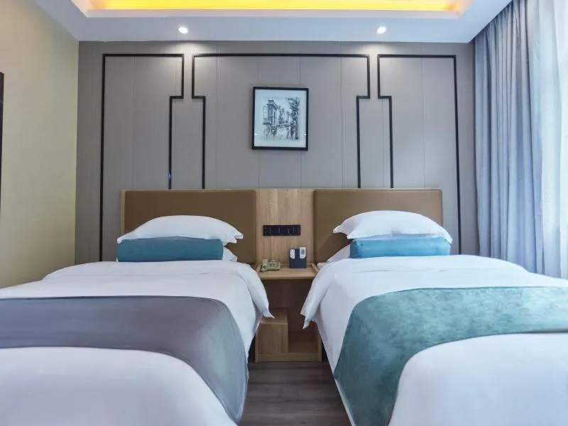 Bed in GreenTree Inn Huangshan TangKou Beauty Spot South Gate Transfer Center Business Hotel