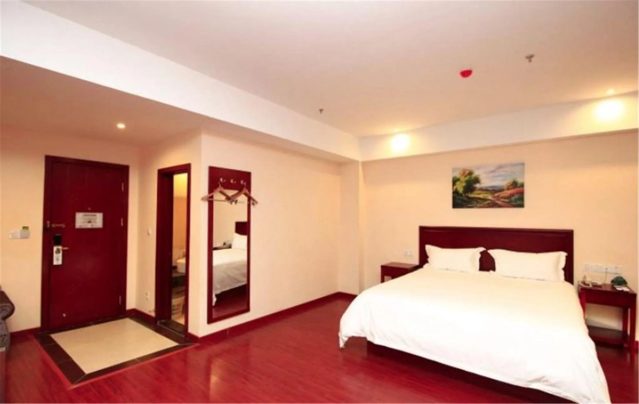 Bed in GreenTree Inn ShanDong RiZhao JuXian YinXing Avenue Middle ShanDong Road Business Hotel