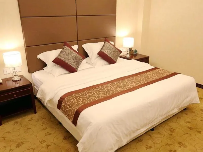 Bed in GreenTree Inn ShanDong RiZhao ShanHaiTian Holiday Resort Business Hotel