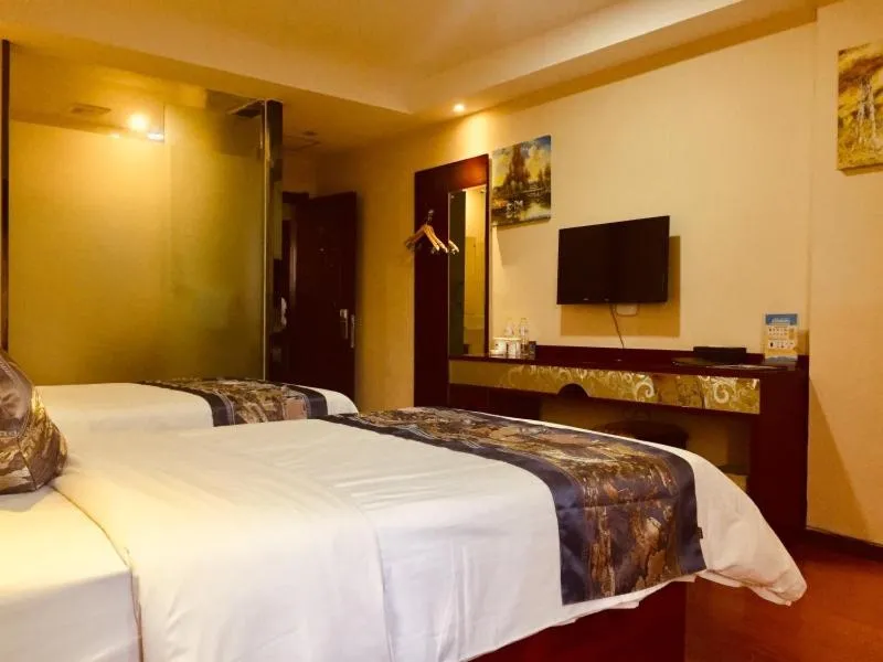 Bed in GreenTree Inn Guangxi Yulin Jincheng Commercial Building Shell Hotel