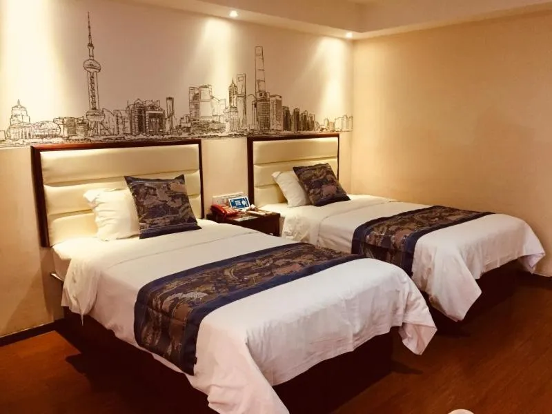 Bed in GreenTree Inn Guangxi Yulin Jincheng Commercial Building Shell Hotel