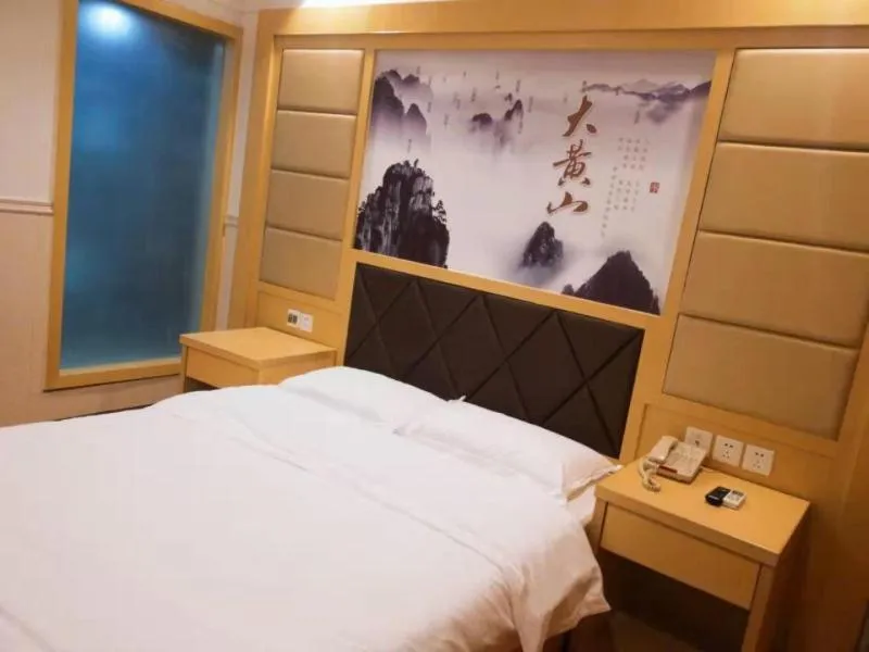 Bed in GreenTree Inn AnHui HuangShan She County HuiZhou Ancient City Middle HuangShan Road Business Hotel