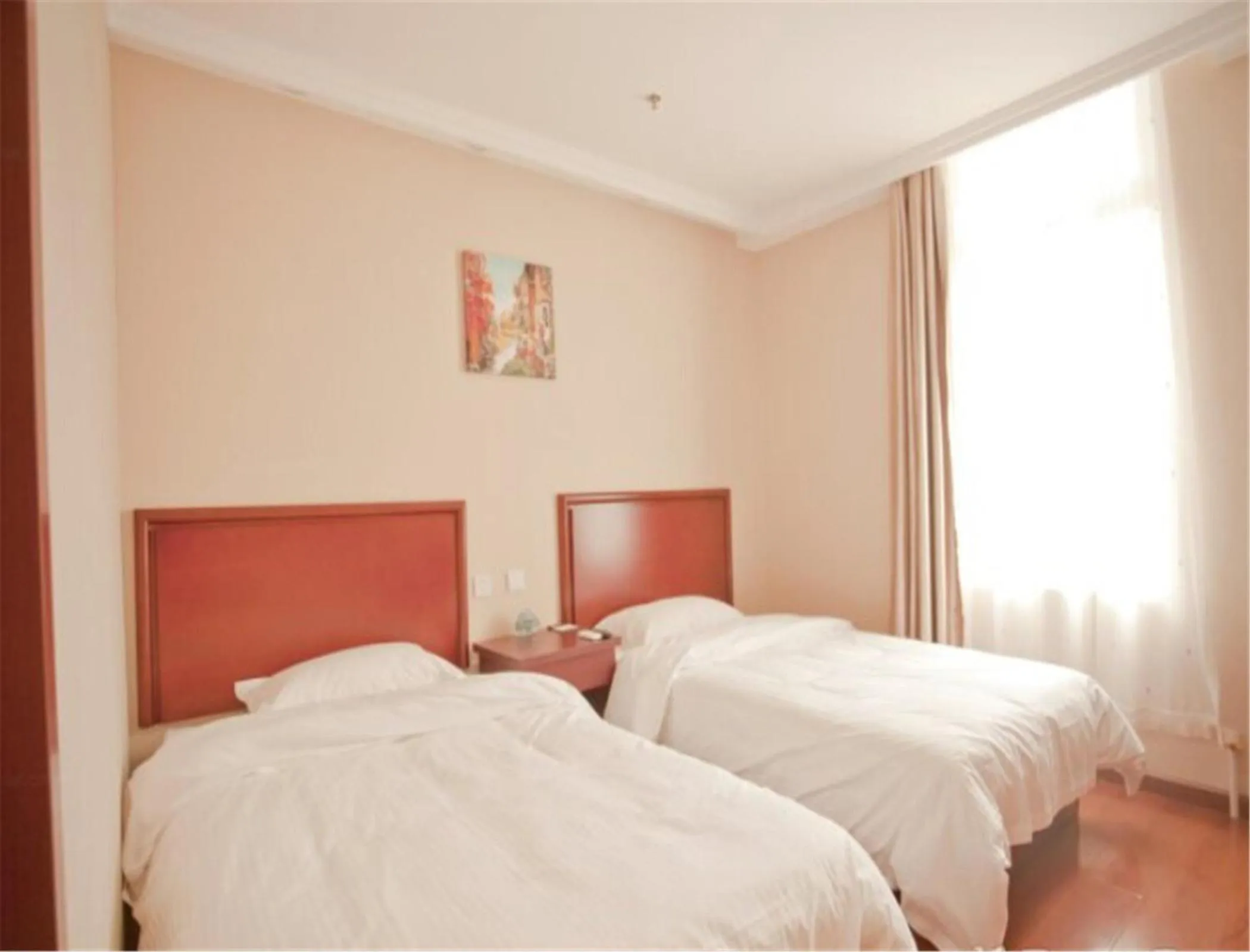 Photo of the whole room, Bed in GreenTree Inn Liaoning Dalian Railway Station South Shengli Square Express Hotel