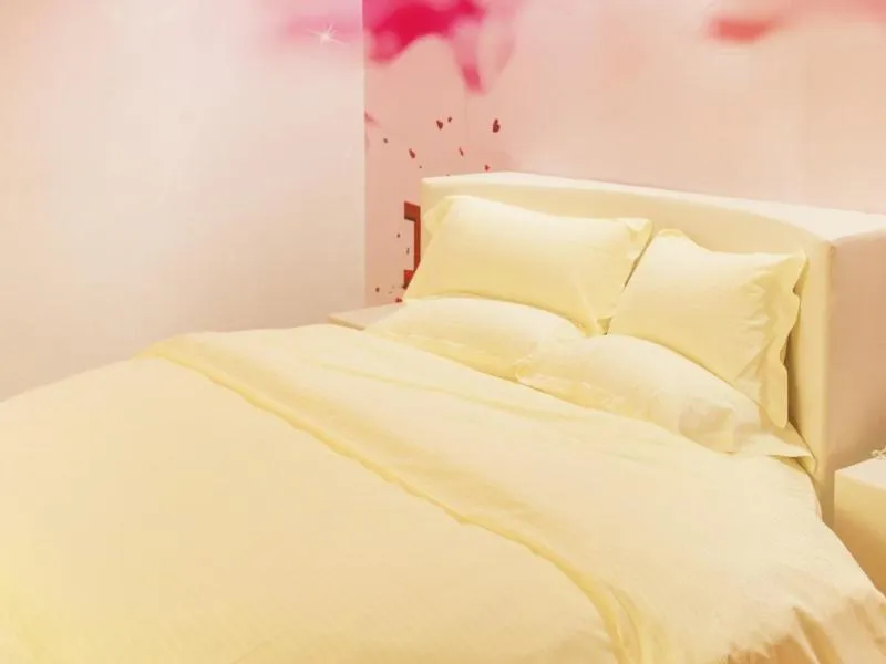 Bed in Vatica JiangSu Wuxi Xibei Canal Metro Station Huilv Road Hotel