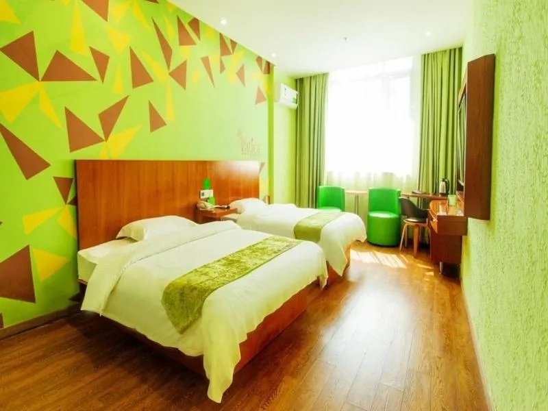 Bed in Vatica JiangSu Wuxi Xibei Canal Metro Station Huilv Road Hotel