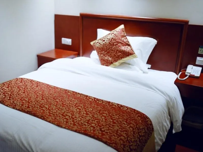 Bed in GreenTree Inn JiangSu XuZhou KuangDa HuaiTa East Gate Express Hotel