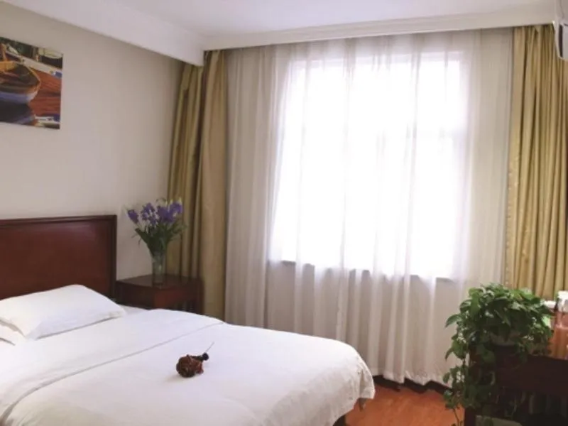 Bed in GreenTree Inn Jiangsu Taizhou Xinghua Zhangguo Bus Station Express Hotel