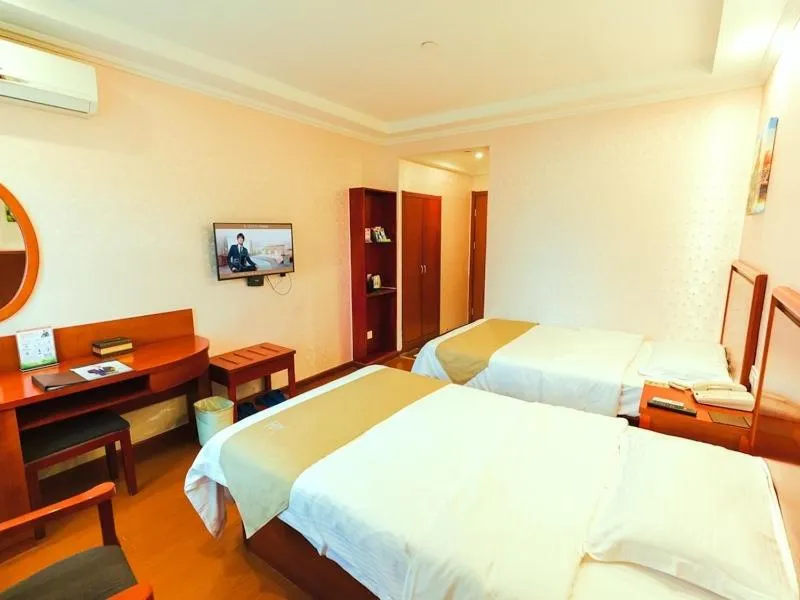 Bed in GreenTree Inn Zhejiang Shaoxing Paojiang Industrial Park Tanggong Road Business Hotel