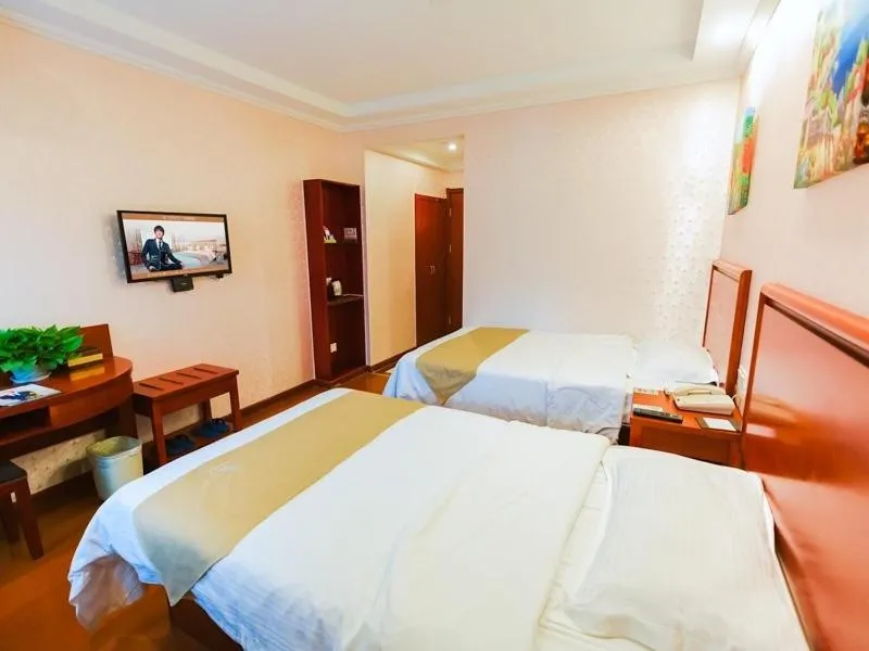 Bed in GreenTree Inn Zhejiang Shaoxing Paojiang Industrial Park Tanggong Road Business Hotel