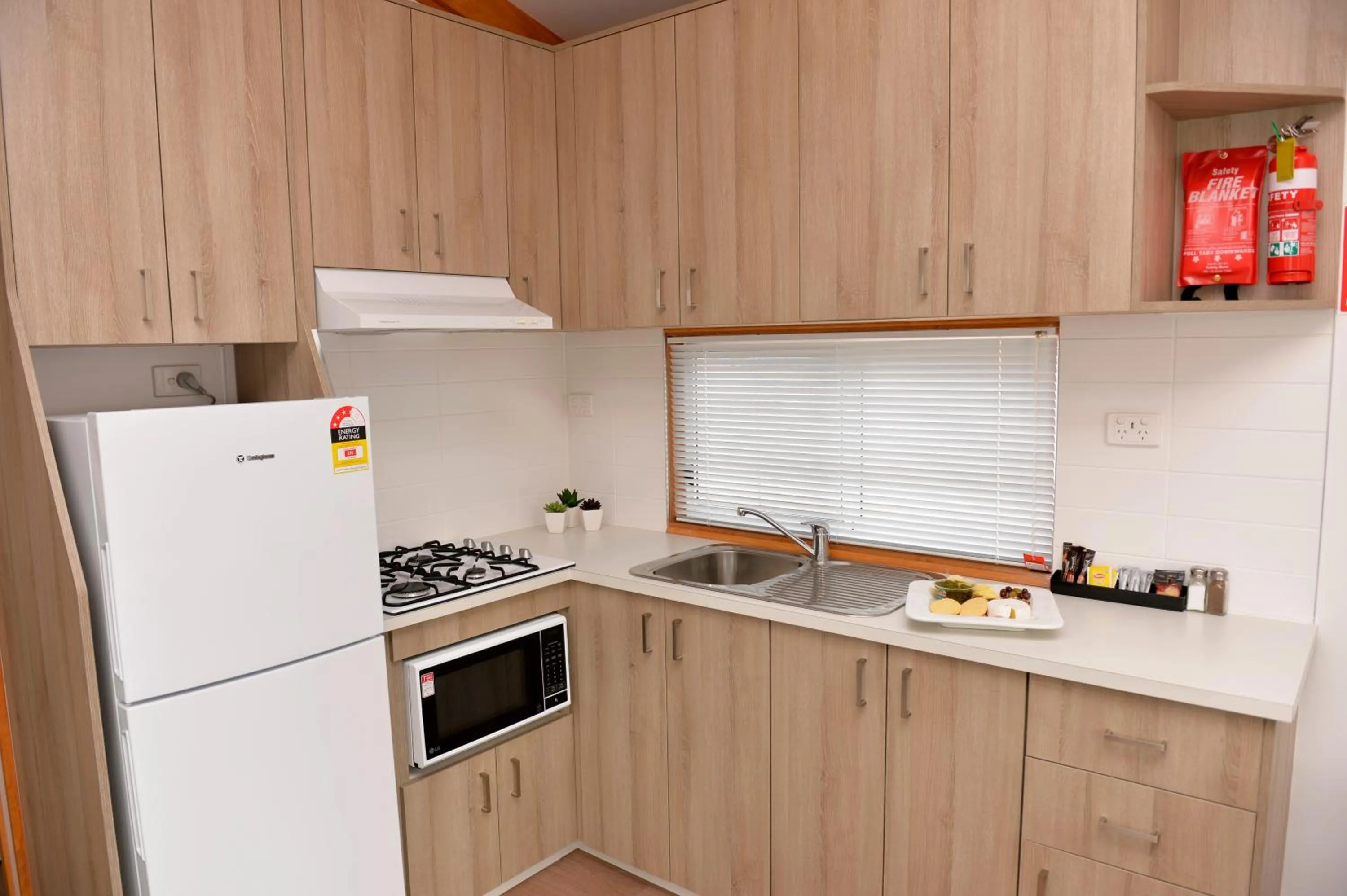 Kitchen or kitchenette in Riverside Cabin Park