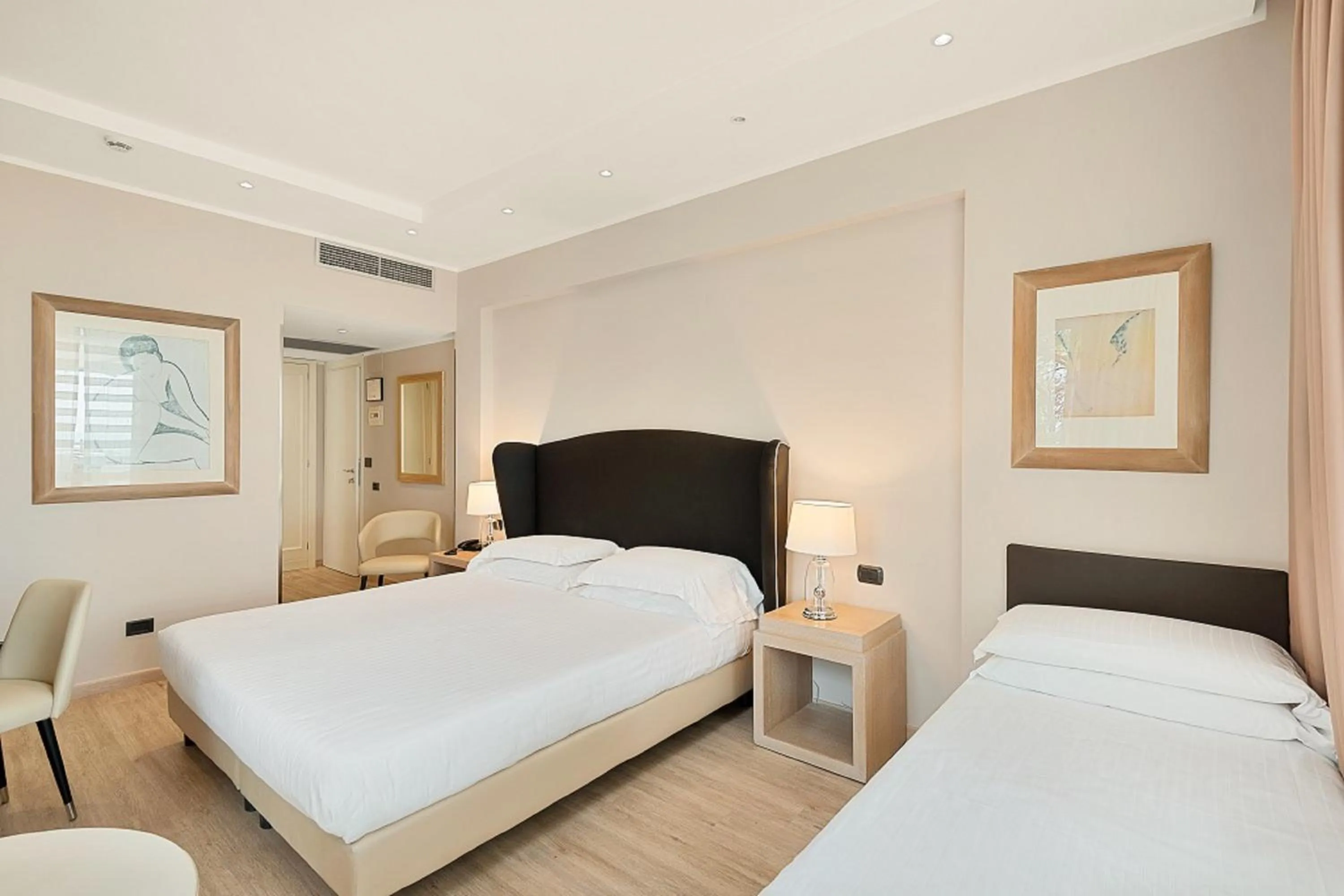 Bed in Hotel Excelsior